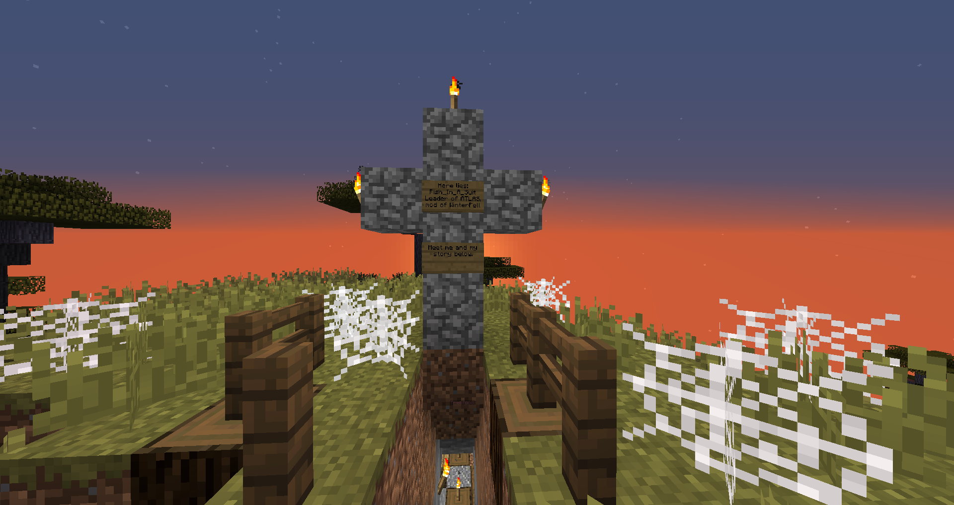 Sun setting behind a grave.png